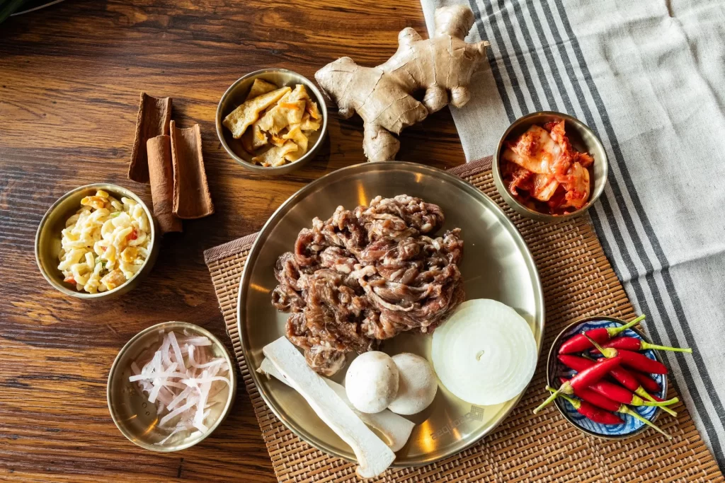 Bulgogi beef with mushrooms, onion, and traditional Korean BBQ sides at Geonbae Frankston VIC